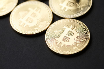 Bitcoin gold coin and chart background.
