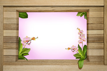 Making greetings in the form of a wooden frame made of oak planks inside with sprigs of orchids and space for text