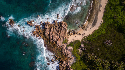 La Digue - Seychelles island with sea, coast and beach - aerial photo taken from above with a drone
