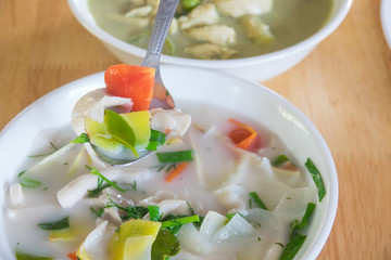 Thai food  coconut sour soup with spoon