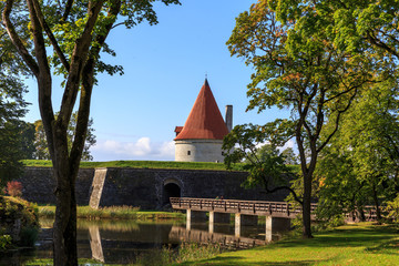 Fototapeta na wymiar Convent Building, Kuressaare castle against a blue sky with clouds, Saaremaa island, Estonia