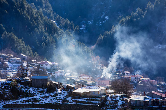 Winter landscape from the mountain range of Pindos and the village of Distrato © ververidis
