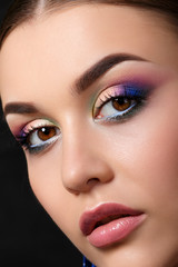 Fototapeta premium Portrait of beautiful woman with fashion makeup