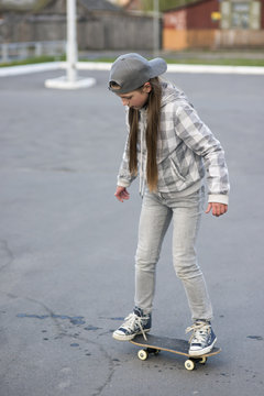 child girl on skateboard