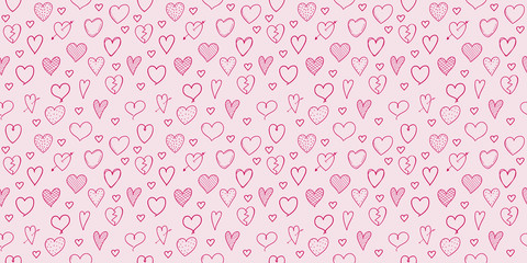 Concept of seamless background with hand drawn hearts. Vector.