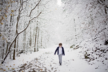 Young boy in the winter snow