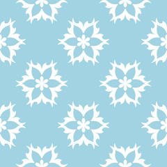 White flowers on blue background. Ornamental seamless pattern