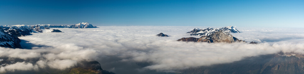 Fototapeta na wymiar Thick clouds above the Alps