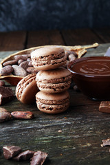 Sweet and colourful french macaroons or macaron on wooden background, Dessert