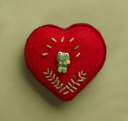 Textile red heart with funny frog