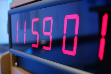Red digital Timer, numbers counting.