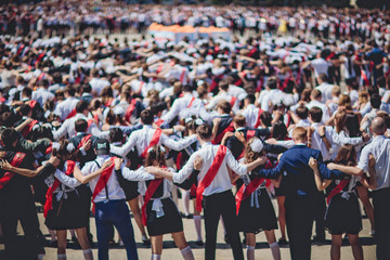 Graduates wearing hats at a final college ceremony
