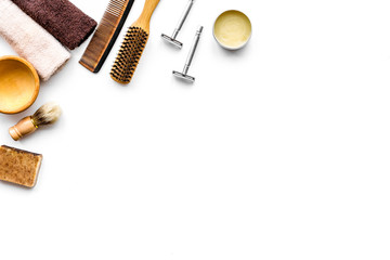 Tools beard and moustaches' care. Razor and brush on white background top view copy space