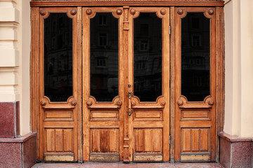 Obraz na płótnie Canvas Wooden old door of building
