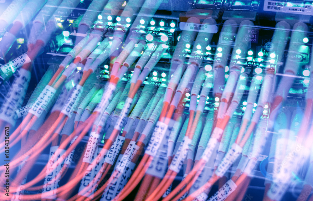 Poster fiber optical connector interface. rack mounted servers in a server room, server rack audio cable. s