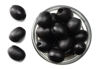 Marinated slices black olives isolated on white background. top view