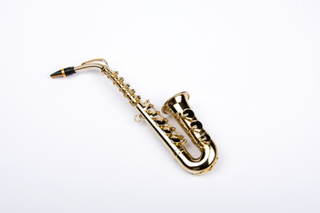 Saxophone view from top on a white background
