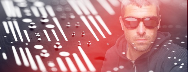 Composite image of portrait of burglar wearing sunglasses