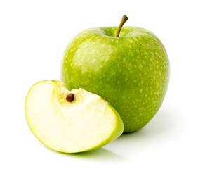 Ripe green Apple and a slice on a white, isolated.