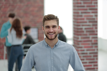 Portrait of confident businessman in office.