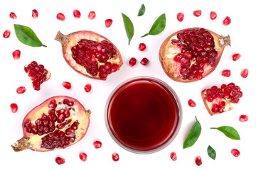 A glass of pomegranate juice with fresh pomegranate fruits isolated on white background. Top view. Flat lay