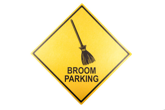 A broom parking sign for Halloween