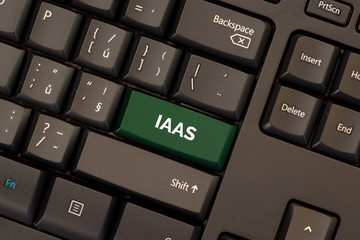 Infrastructure as a service (IAAS) concept on green button on keyboard