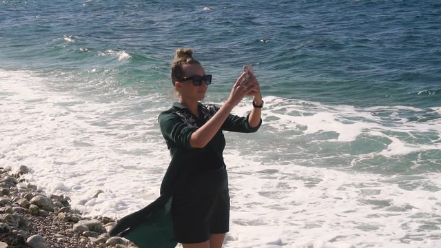 Woman on holidays taking a picture to herself