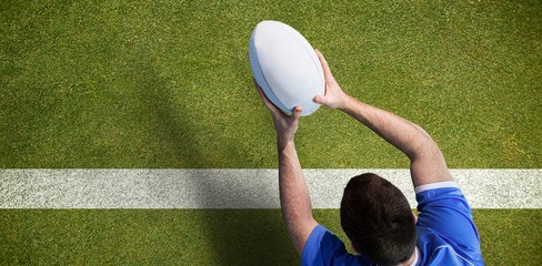 Composite image of a rugby player scoring a try