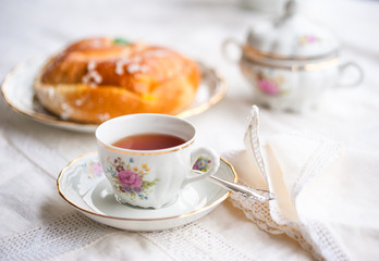 Luxury porcelain tea set with a cup, teapot, sugar bowl