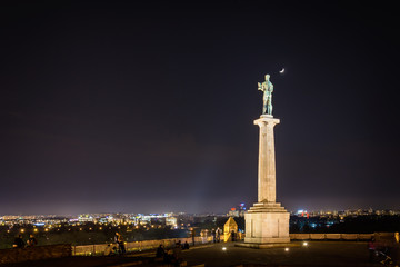 Fototapeta premium Belgrade, Serbia March 30, 2017: Kalemegdan fortress and Statue of the Victor in Belgrade at night