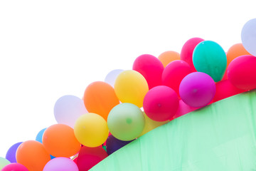 Fototapeta na wymiar Colorful balloons decorate on arched entrance isolated on white background