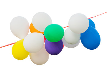 Colorful branch balloons on red rope isolated on white background