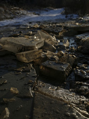 crushed ice blocks on winter mountain road