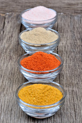 Spices in a transparent bowls on table