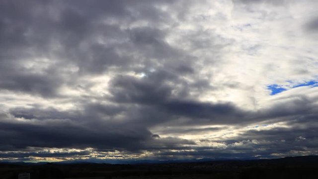 Stormy clouds over Pyrenean mountains moving at high speed
