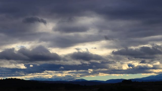 Stormy clouds over Pyrenean mountains moving at high speed
