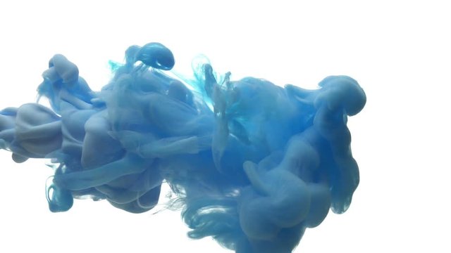 Blue ink dropped in water on white background
