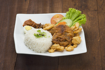 chicken steak with wooden background