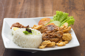 chicken steak with wooden background