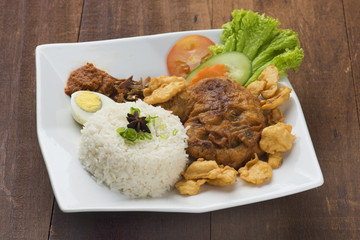 chicken steak with wooden background