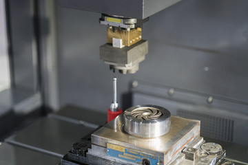 operator use  EDM electrod to make precision mold and die