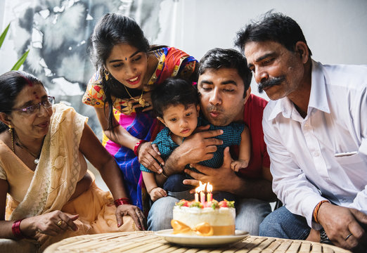 Indian Family Celebrating A Birthday Party