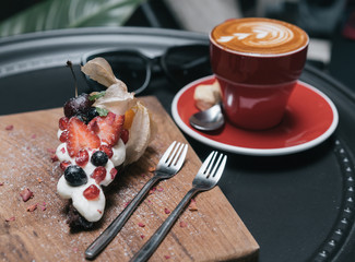 red coffee cup on the table