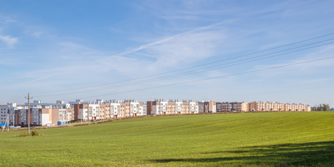 Fototapeta na wymiar Low-rise houses in the field