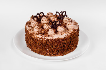 Cake on a white background with tenderloin