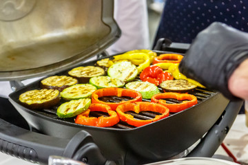 Vegetables cut into rings fried on the grill.