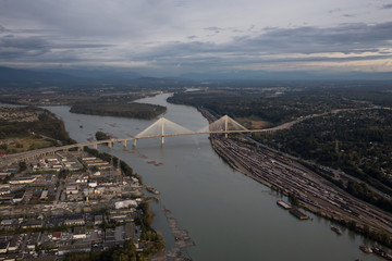 Aerial view of Port Mann Bridge crossing Fraser River from Surrey to Coquitlam in Vancouver,...