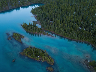 Aerial landscape view of the beautiful glacier lake during a vibrant sunrise. Taken in Garibaldi, near Whistler and Squamish, North of Vancouver, BC, Canada.