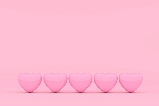 five pink heart put on the pink floor.  valentine day love concept. minimal style concept